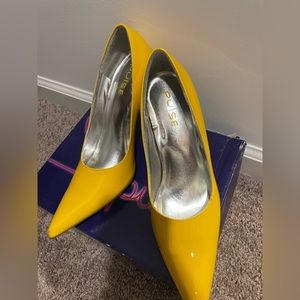 Brand new patten leather yellow pumps